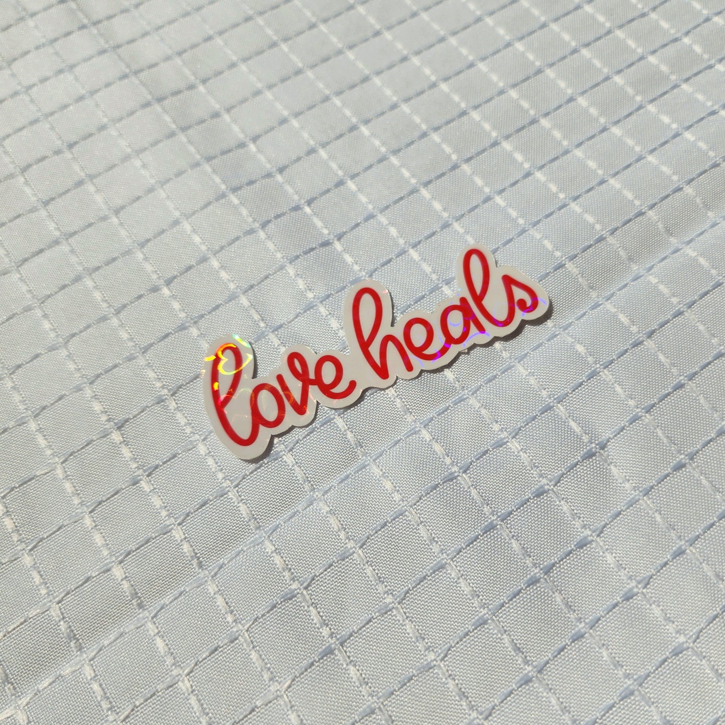 love heals sticker