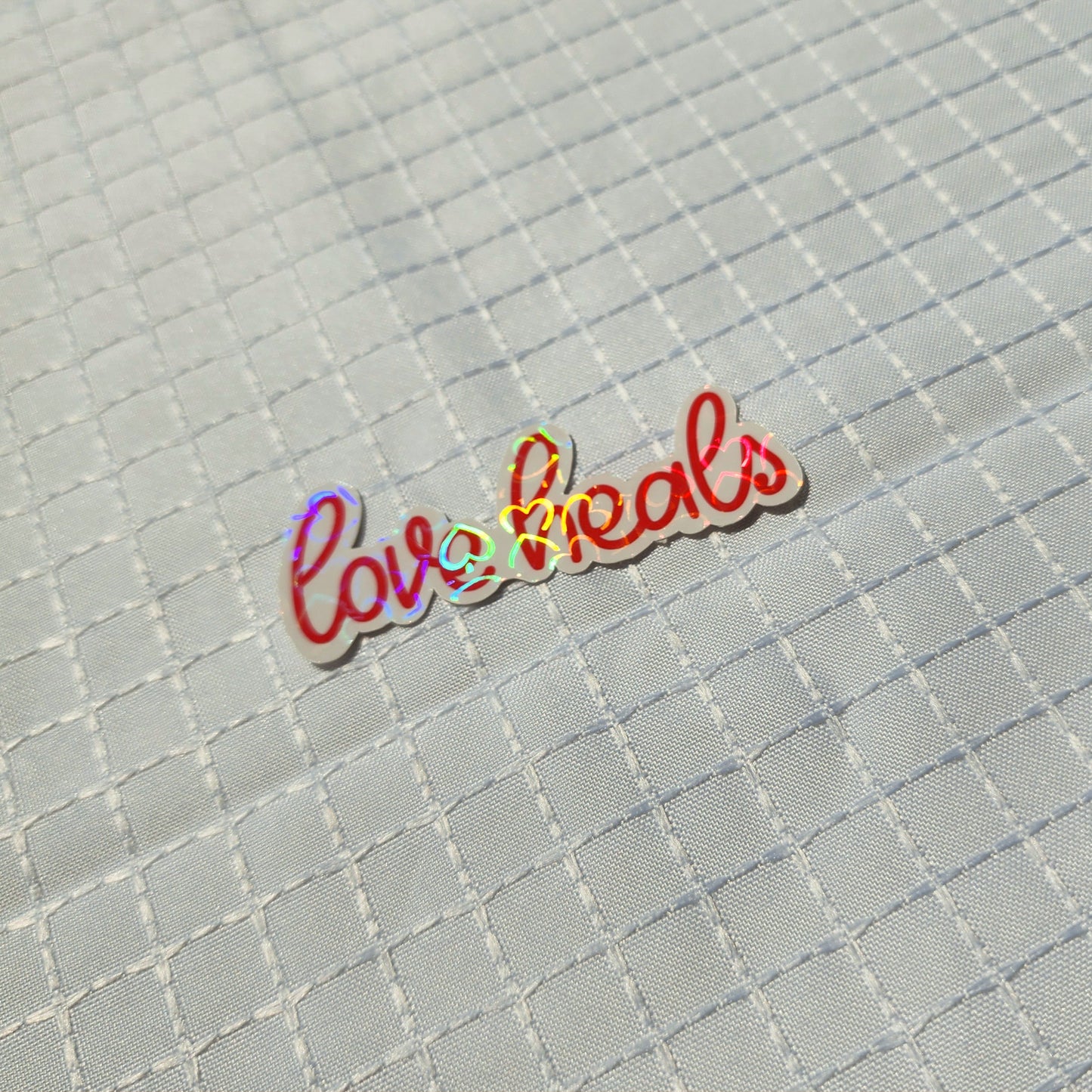 love heals sticker