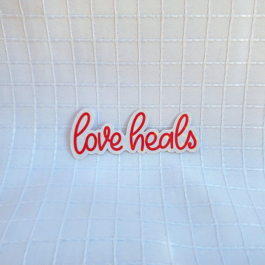 love heals sticker