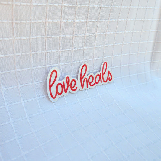 love heals sticker
